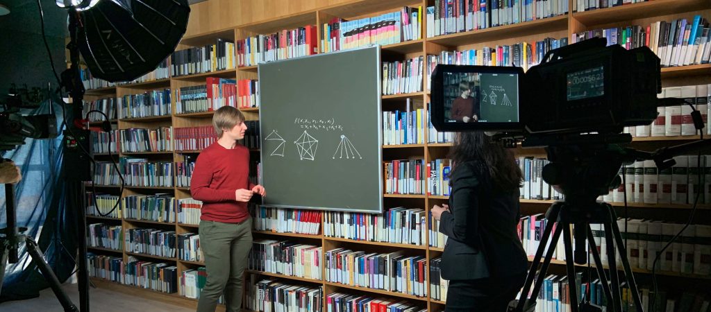 Mathematician Jaron Gundersen explaining graph topology at video shoot, March 2021